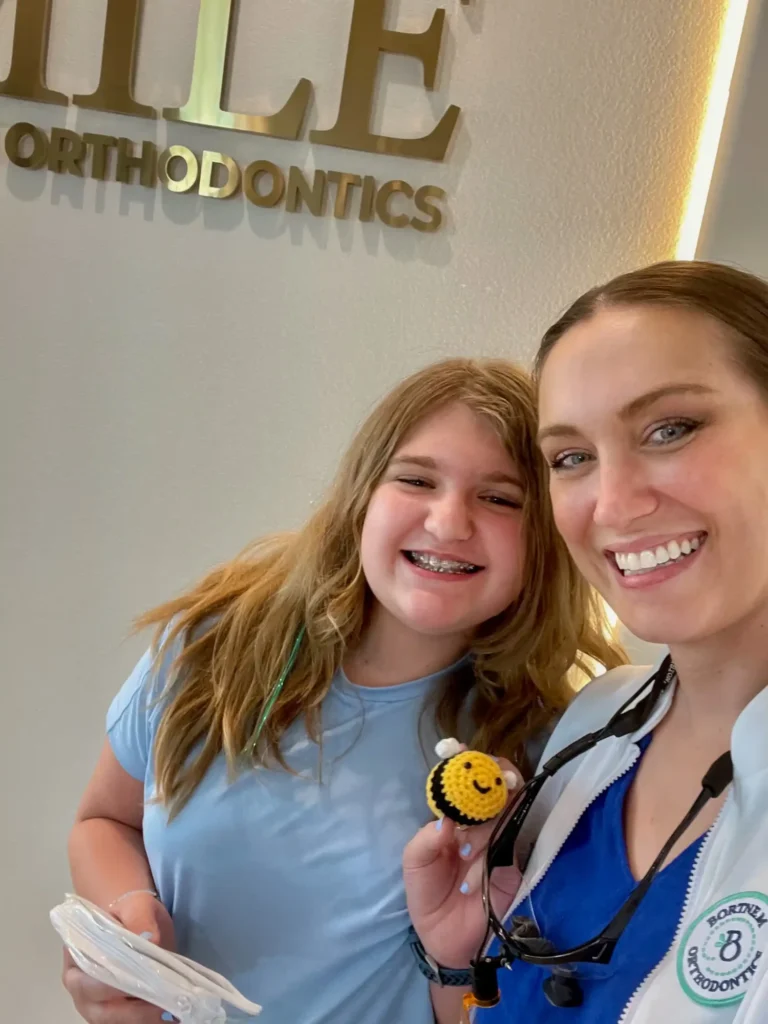 Happy patient receiving orthodontic care in Weatherford
