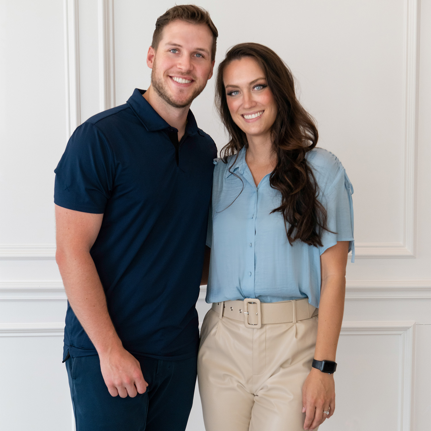 Doctor Lena Bortnem and Doctor Eric Bortnem standing side-by-side smiling.